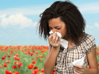 Woman suffering from seasonal allergies.