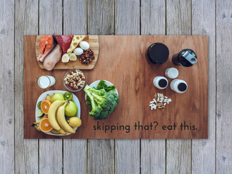 A table covered with an array of foods and supplements. Written over the images is 